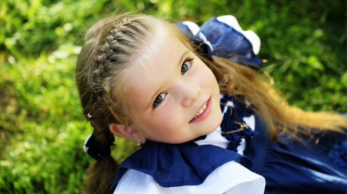 15 Easy Braid Hairstyles for Kids | These simple hairstyles for kids are a cute way to dress-up your daughter’s hair for back to school, at weddings, for dance class, and beyond! With 15 step by step tutorials, we’ll teach you how to French braid hair and teach you how to do Dutch braids, crown braids, waterfall braids, and so much more! #braids #braidsforkids #hairstylesforkids #frenchbraid #dutchbraid #schoolhairstyles #waterfallbraid