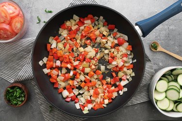 Cook onion, bell pepper and garlic