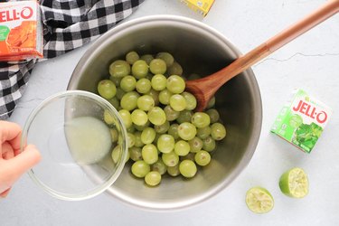 Toss grapes with lime juice