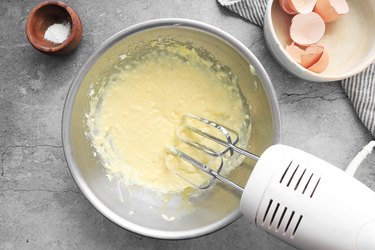 Beat cream cheese and egg yolks