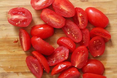 Slice grape tomatoes