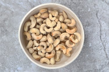 Soak cashews in water