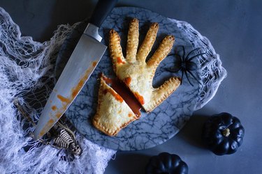 Severed hand meat pie