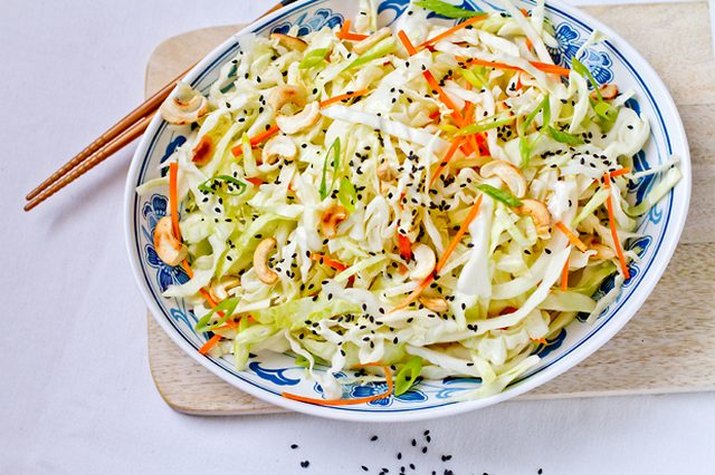 cabbage salad with roasted cashews and sesame maple dressing