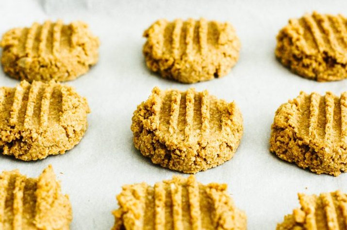 A batch of healthy, four-ingredient peanut butter cookies.