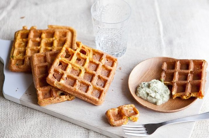 A stack of spicy garbanzo waffles served with mint cilantro chutney.