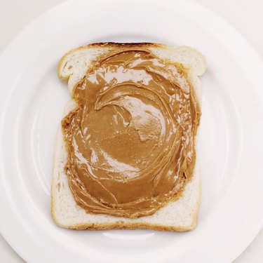 close-up of a slice of bread with peanut butter